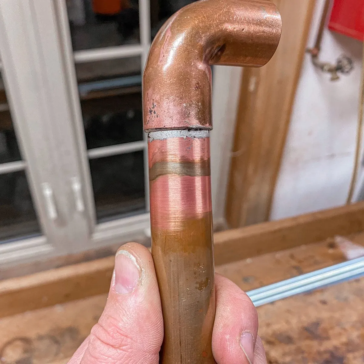 Corroded copper fitting removed from an aging Ballwin home supply line